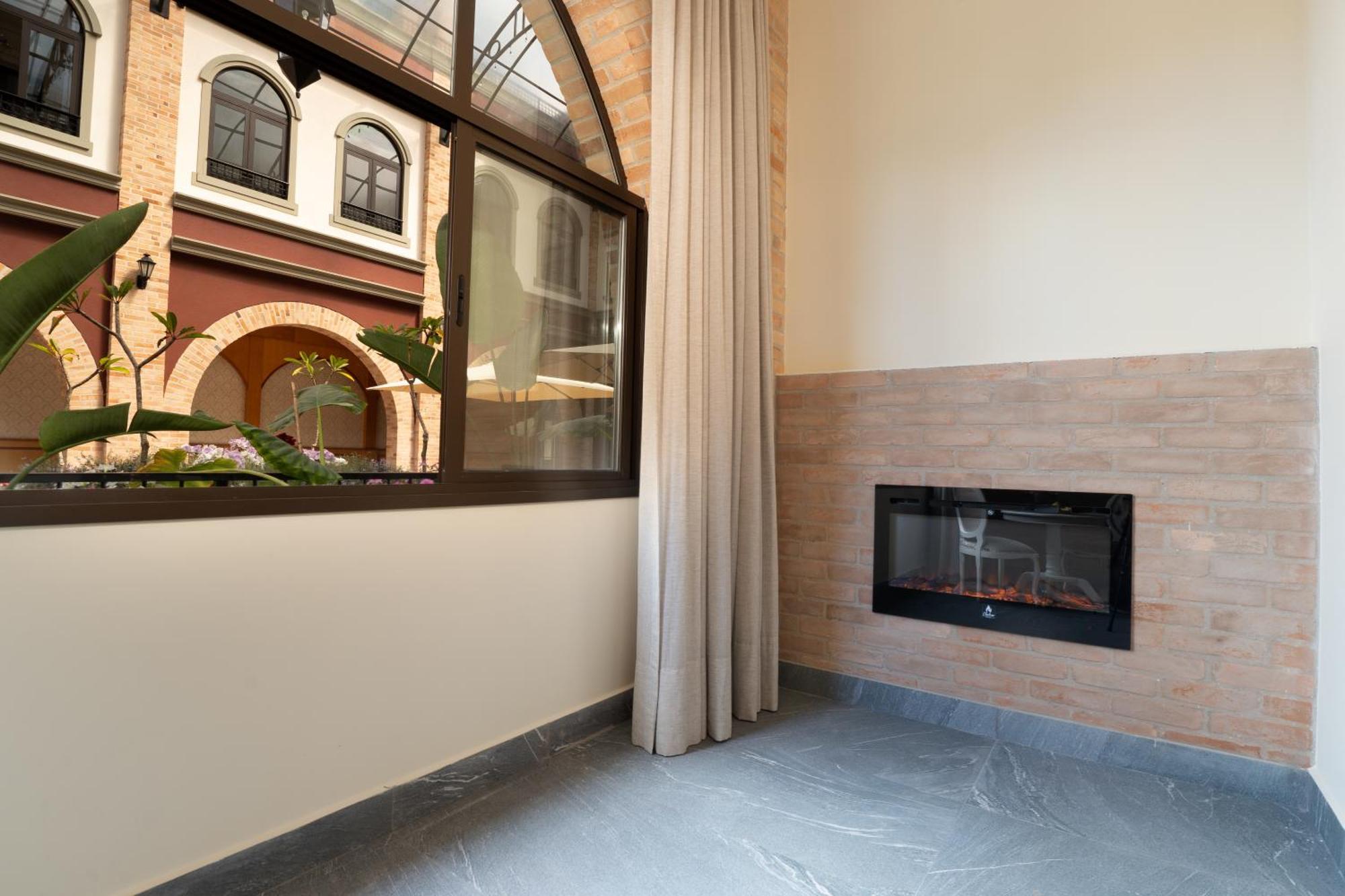 Pousada Luis XV Campos do Jordão Exteriér fotografie A fireplace in a home
